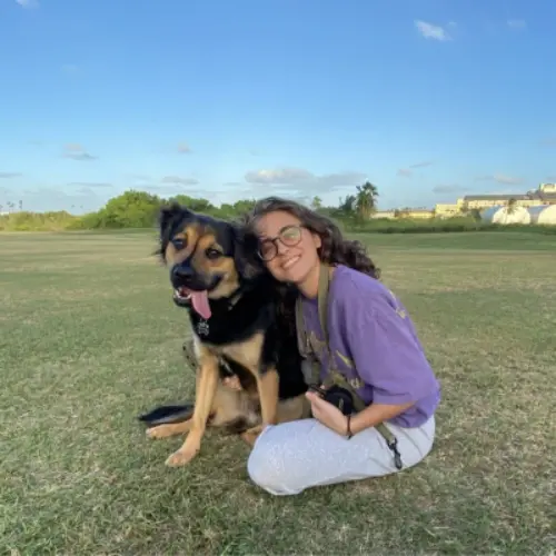 Ariana Georgescu, DVM, with her dog.